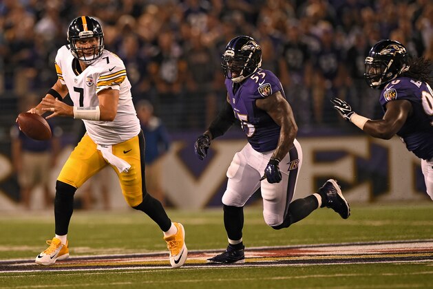 BALTIMORE, MD - SEPTEMBER 11: Quarterback Ben Roethlisberger #7 of the Pittsburgh Steelers eludes outside linebacker Terrell Suggs #55 of the Baltimore Ravens in the first half at M&T Bank Stadium on September 11, 2014 in Baltimore, Maryland. The Baltimore Ravens won, 26-6. (Photo by Patrick Smith/Getty Images)