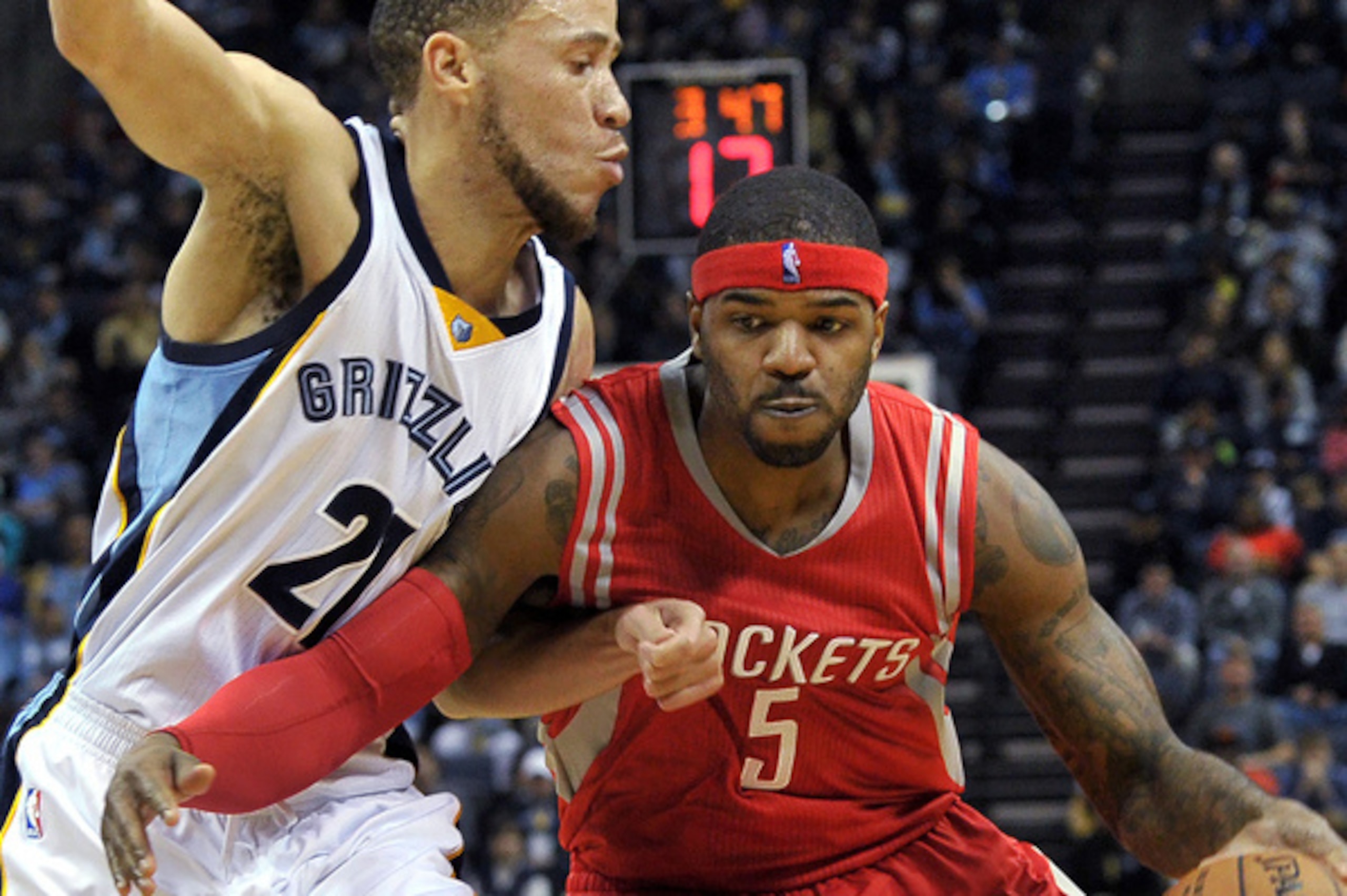 Houston Rockets forward Josh Smith (5) works for position against Memphis Grizzlies forward Tayshaun Prince (21) during the first half of an NBA basketball game Friday, Dec. 26, 2014, in Memphis, Tenn. (AP Photo/Brandon Dill)