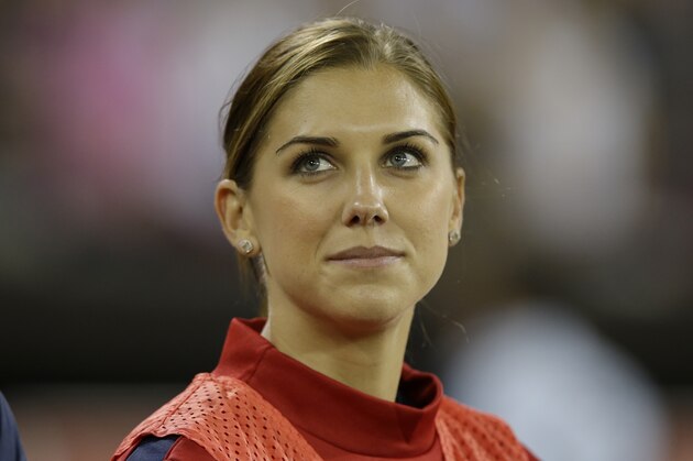 United States' forward Alex Morgan stands before an international friendly soccer match against Mexico at RFK Stadium Tuesday, Sept. 3, 2013, in Washington. (AP Photo/Alex Brandon)