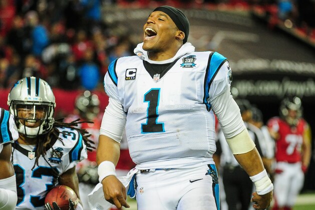 ATLANTA, GA - DECEMBER 28:  Cam Newton #1 of the Carolina Panthers celebrates a interception return for a touchdown by Tre Boston #33 in the second half against the Atlanta Falcons at the Georgia Dome on December 28, 2014 in Atlanta, Georgia.  (Photo by Scott Cunningham/Getty Images)