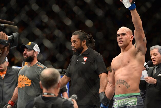 Dec 6, 2014; Las Vegas, NV, USA;  Robbie Lawler (blue) after defeating Johnny Hendricks (red) during UFC 181 at Madalay Bay Events Center. Lawler won via split decision. Mandatory Credit: Joe Camporeale-USA TODAY Sports
