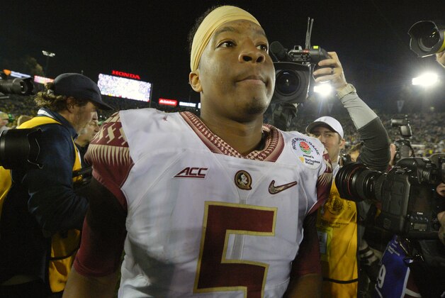 Florida State quarterback Jameis Winston walks off the field after their loss to Oregon during the Rose Bowl NCAA college football playoff semifinal, Thursday, Jan. 1, 2015, in Pasadena, Calif. (AP Photo/Mark J. Terrill)