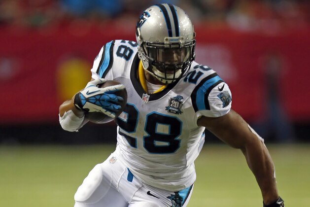 Carolina Panthers running back Jonathan Stewart (28) runs the ball against the Atlanta Falcons during an NFL football game on Sunday, Dec. 28, 2014 in Atlanta. The Panthers won the game 34-3. (Jeff Haynes/AP Images for Panini)
