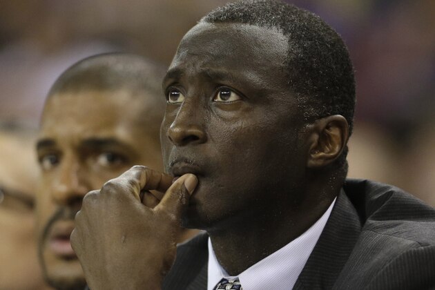 Sacramento Kings interim head coach Tyrone Crobin, left, watches his team battle the Los Angeles Lakers during the first half of an NBA basketball game in Sacramento, Calif., Sunday, Dec. 21, 2014. The Kings beat the Lakers 108-101 to give Corbin his first win as head coach since replacing Michael Malone who was fired last week.(AP Photo/Rich Pedroncelli) Sacramento Kings interim head coach Tyrone Crobin, left, watches his team battle the Los Angeles Lakers during the first half of an NBA basketball game in Sacramento, Calif., Sunday, Dec. 21, 2014. The Kings beat the Lakers 108-101 to give Corbin his first win as head coach since replacing Michael Malone who was fired last week.(AP Photo/Rich Pedroncelli)