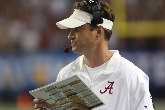 Dec 6, 2014; Atlanta, GA, USA; Alabama Crimson Tide offensive coordinator Lane Kiffin watches from the sidelines against Missouri in the first quarter of the 2014 SEC Championship at the Georgia Dome. Mandatory Credit: Jason Getz-USA TODAY Sports