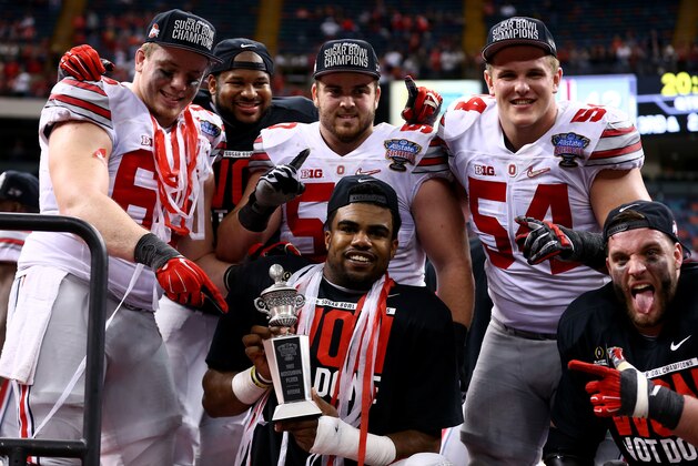 NEW ORLEANS, LA - JANUARY 01: Ezekiel Elliott #15 of the Ohio State Buckeyes celebrates with his trophy after defeating the Alabama Crimson Tide in the All State Sugar Bowl at the Mercedes-Benz Superdome on January 1, 2015 in New Orleans, Louisiana. The Ohio State Buckeyes defeated the Alabama Crimson Tide 42 to 35. (Photo by Streeter Lecka/Getty Images) NEW ORLEANS, LA - JANUARY 01: Ezekiel Elliott #15 of the Ohio State Buckeyes celebrates with his trophy after defeating the Alabama Crimson Tide in the All State Sugar Bowl at the Mercedes-Benz Superdome on January 1, 2015 in New Orleans, Louisiana. The Ohio State Buckeyes defeated the Alabama Crimson Tide 42 to 35. (Photo by Streeter Lecka/Getty Images)