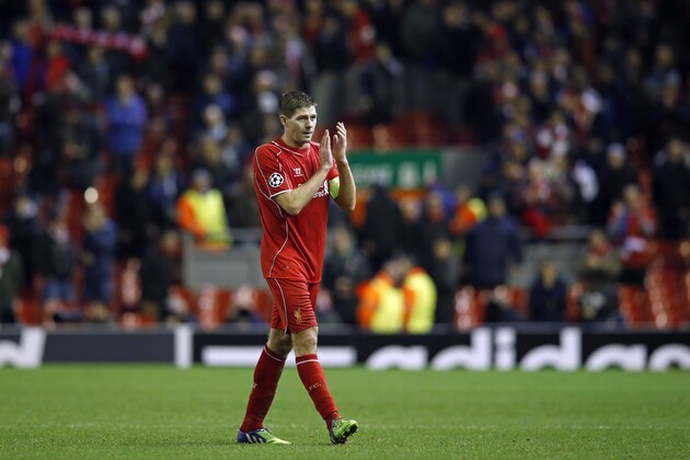 Liverpool's Steven Gerrard leaves the field at the end of the Champions League Group B soccer match between Liverpool and FC Basel at Anfield Stadium in Liverpool, England, Tuesday, Dec. 9, 2014. The match ended 1-1. (AP Photo/Jon Super)