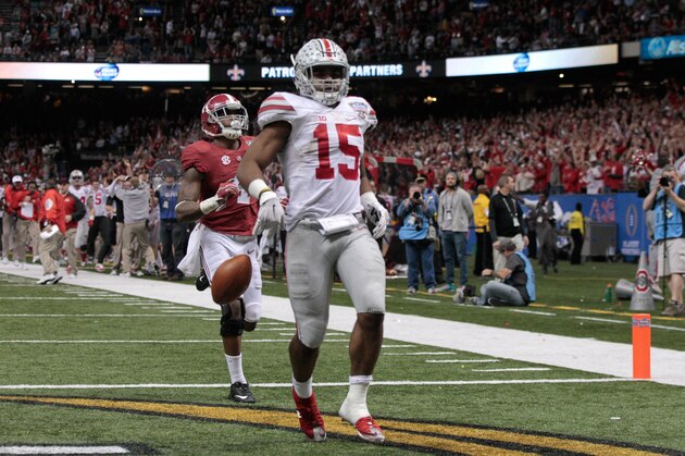 NEW ORLEANS, LA - JANUARY 01:  Ezekiel Elliott #15 of the Ohio State Buckeyes celebrates after scoring a touchdown in the fourth quarter against the Alabama Crimson Tide during the All State Sugar Bowl at the Mercedes-Benz Superdome on January 1, 2015 in New Orleans, Louisiana.  (Photo by Sean Gardner/Getty Images)