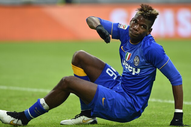 TURIN, ITALY - DECEMBER 14:  Paul Pogba of Juventus FC reacts during the Serie A match between Juventus FC and UC Sampdoria at Juventus Arena on December 14, 2014 in Turin, Italy.  (Photo by Valerio Pennicino/Getty Images)