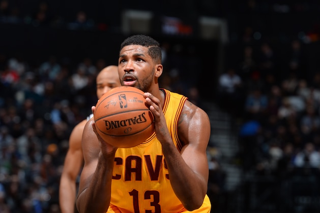 NEW YORK, NY - DECEMBER 8:  Tristan Thompson #13 of the Cleveland Cavaliers prepares to shoot a free throw against the Brooklyn Nets on December 8, 2014 at the Barclays Center in the Brooklyn borough of New York City. NOTE TO USER: User expressly acknowledges and agrees that, by downloading and or using this Photograph, user is consenting to the terms and conditions of the Getty Images License Agreement. Mandatory Copyright Notice: Copyright 2014 NBAE (Photo by Jesse D. Garrabrant/NBAE via Getty Images)