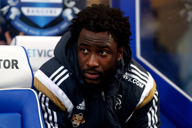 LONDON, ENGLAND - JANUARY 01:  Substitute Wilfried Bony of Swansea City looks on during the Barclays Premier League match between Queens Park Rangers and Swansea City at Loftus Road on January 1, 2015 in London, England.  (Photo by Harry Engels/Getty Images)