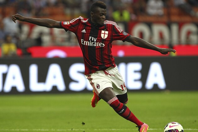 MILAN, ITALY - AUGUST 31:  Mbaye Niang of AC Milan in action during the Serie A match between AC Milan and SS Lazio at Stadio Giuseppe Meazza on August 31, 2014 in Milan, Italy.  (Photo by Marco Luzzani/Getty Images)