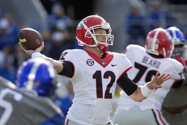 Georgia quarterback Brice Ramsey throws to a receiver during the second half of an NCAA college football game against Kentucky at Commonwealth Stadium in Lexington, Ky., Saturday, Nov. 8, 2014. Georgia beat Kentucky 63-31. (AP Photo/David Stephenson)