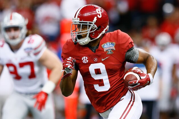 NEW ORLEANS, LA - JANUARY 01:  Amari Cooper #9 of the Alabama Crimson Tide runs the ball in the first quarter against the Ohio State Buckeyes during the All State Sugar Bowl at the Mercedes-Benz Superdome on January 1, 2015 in New Orleans, Louisiana.  (Photo by Kevin C. Cox/Getty Images)