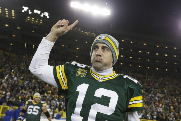 Green Bay Packers' Aaron Rodgers celebrates after an NFL football game against the Detroit Lions Sunday, Dec. 28, 2014, in Green Bay, Wis. The Packers won 30-20. (AP Photo/Morry Gash)