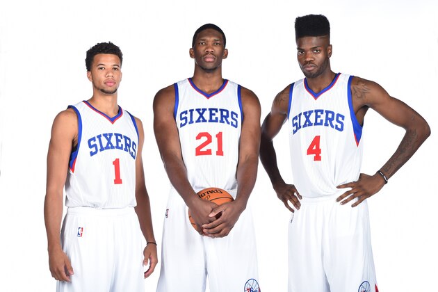 PHILADELPHIA, PA - SEPTEMBER 29:  Michael Carter-Williams #1, Joel Embiid #21, and Nerlens Noel #4 of the Philadelphia 76ers during NBA Media Day on September 29, 2014 at Wells Fargo Center in Philadelphia, Pennsylvania. NOTE TO USER: User expressly acknowledges and agrees that, by downloading and or using this photograph, User is consenting to the terms and conditions of the Getty Images License Agreement. Mandatory Copyright Notice: Copyright 2014 NBAE (Photo by Jesse D. Garrabrant/NBAE via Getty Images)