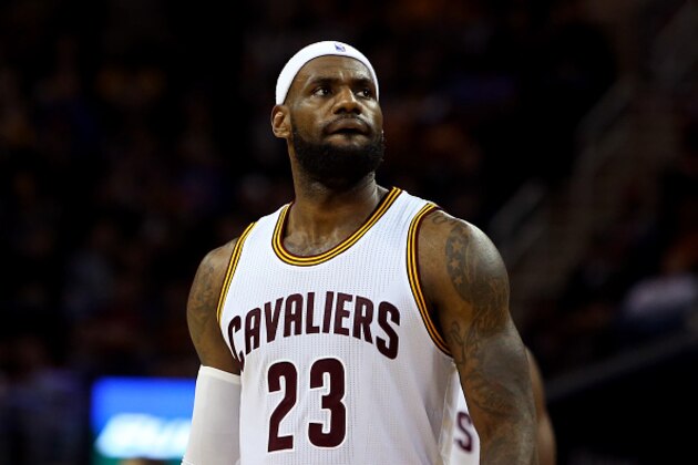 CLEVELAND, OH - DECEMBER 23:  LeBron James #23 of the Cleveland Cavaliers looks on in the game against the Minnesota Timberwolves at Quicken Loans Arena on December 23, 2014 in Cleveland, Ohio. NOTE TO USER: User expressly acknowledges and agrees that, by downloading and or using this photograph, User is consenting to the terms and conditions of the Getty Images License Agreement.  (Photo by Mike Lawrie/Getty Images)
