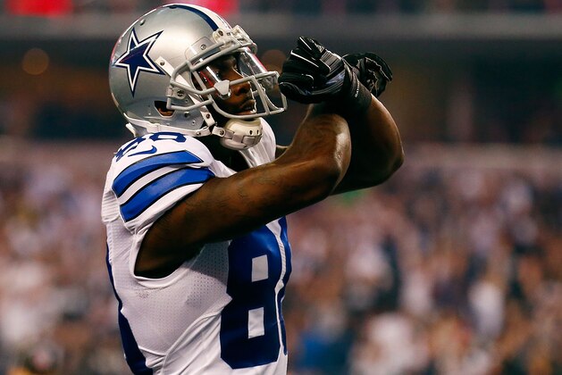 ARLINGTON, TX - DECEMBER 21:  Dez Bryant #88 of the Dallas Cowboys celebrates his touchdown reception against the Indianapolis Colts in the first half at AT&T Stadium on December 21, 2014 in Arlington, Texas.  (Photo by Tom Pennington/Getty Images)
