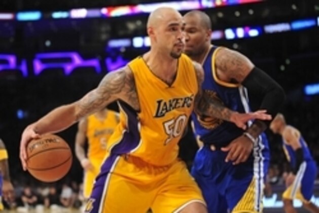 December 23, 2014; Los Angeles, CA, USA; Los Angeles Lakers center Robert Sacre (50) moves to the basket against the Golden State Warriors during the second half at Staples Center. Mandatory Credit: Gary A. Vasquez-USA TODAY Sports December 23, 2014; Los Angeles, CA, USA; Los Angeles Lakers center Robert Sacre (50) moves to the basket against the Golden State Warriors during the second half at Staples Center. Mandatory Credit: Gary A. Vasquez-USA TODAY Sports