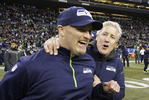 Seattle Seahawks head coach Pete Carroll, right, celebrates with defensive coordinator Dan Quinn, left, after they defeated the St. Louis Rams 20-6 in an NFL football game, Sunday, Dec. 28, 2014, in Seattle. (AP Photo/Scott Eklund) Seattle Seahawks head coach Pete Carroll, right, celebrates with defensive coordinator Dan Quinn, left, after they defeated the St. Louis Rams 20-6 in an NFL football game, Sunday, Dec. 28, 2014, in Seattle. (AP Photo/Scott Eklund)