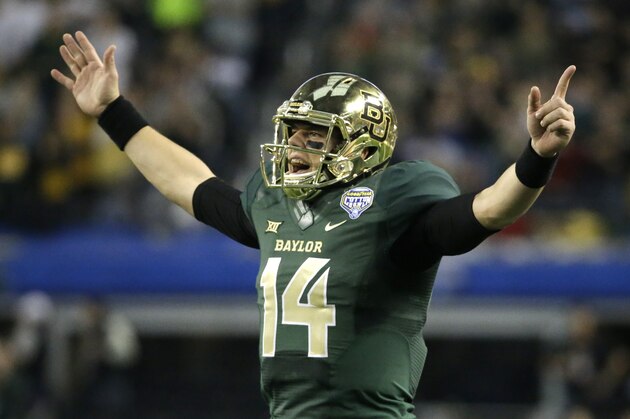 Baylor quarterback Bryce Petty (14) celebrates a touchdown pass during the second half of the Cotton Bowl NCAA college football game Michigan State, Thursday, Jan. 1, 2015, in Arlington, Texas. (AP Photo/LM Otero)