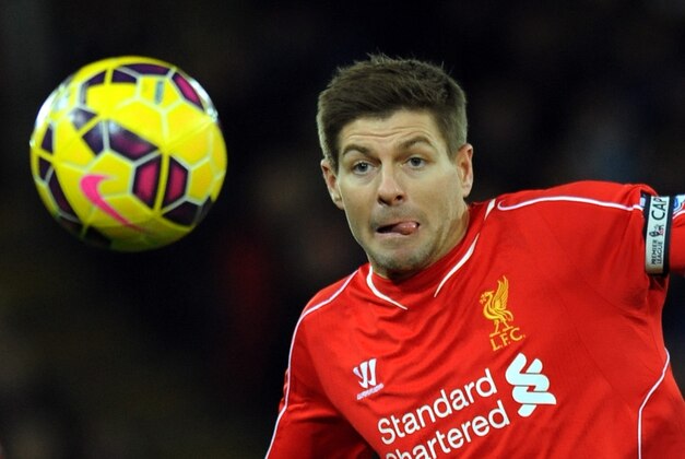 Liverpool's captain Steven Gerrard during the English Premier League soccer match between Leicester City and Liverpool at King Power Stadium, in Leicester, England, Tuesday, Dec. 2, 2014.  (AP Photo/Rui Vieira)