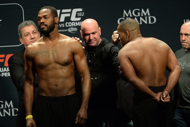 Jan 2, 2015; Las Vegas, NV, USA;   UFC President Dana White separates Jon Jones and Daniel Cormier during the weigh in for their Light Heavyweight Title Bout at MGM Grand Garden Arena. Mandatory Credit: Jayne Kamin-Oncea-USA TODAY Sports