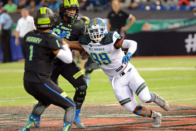 Jan 2, 2015; St. Petersburg, FL, USA; Team Highlight defensive end Byron Cowart (99) rushes the quarterback during the second half of the 2015 Under Armour All-America Game at Tropicana Field. Team Highlight defeated Team Armour  46-6. Mandatory Credit: Jonathan Dyer-USA TODAY Sports