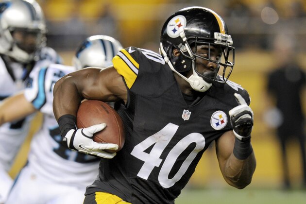 FILE - In this Aug. 28, 2014, file photo, Pittsburgh Steelers running back Josh Harris (40) runs away from Carolina Panthers defensive back Colin Jones (42) in the fourth quarter of a NFL preseason football game in Pittsburgh. While quarterbacks and other big-name, high-salaried players get most of the attention, unlikely heroes often emerge in the playoffs to help their team win. Philly Brown, Josh Harris and Cole Beasley are among the lesser-known players who could step up this wild-card weekend. (AP Photo/Don Wright, File)