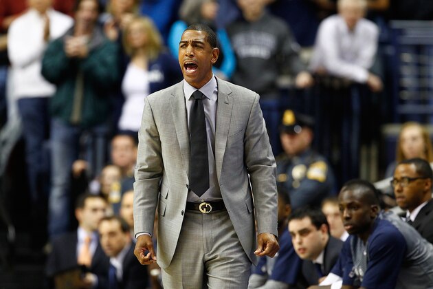 STORRS, CT - NOVEMBER 14: Head coach Kevin Ollie of the Connecticut Huskies yells to his team in the first half against the Byrant Bulldogs during the game at Harry A. Gampel Pavilion on November 14, 2014 in Storrs, Connecticut.  (Photo by Jared Wickerham/Getty Images)