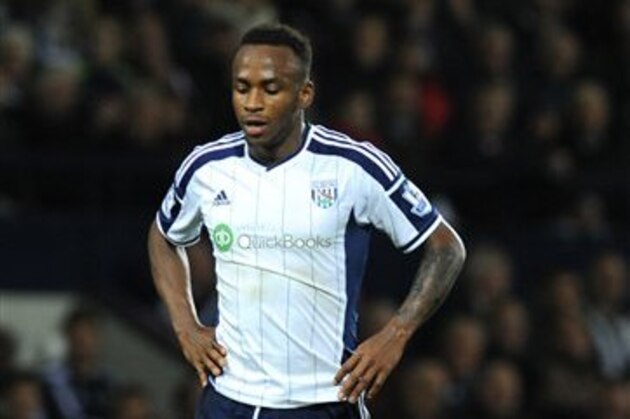 In this Monday, Oct. 20, 2014, file photo, West Brom's Saido Berahino during the English Premier League soccer match between West Bromwich Albion and Manchester United at the Hawthorns, Birmingham. Saido Berahino’s path to becoming one of the new sensations of English football began with kickabouts on the streets of Burundi using a makeshift ball made from plastic bags or rolled-up socks. (AP Photo/Rui Vieira, File)