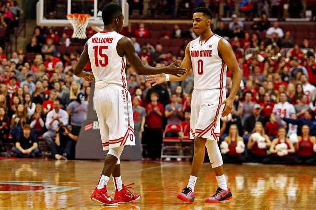 COLUMBUS, OH - DECEMBER 6:  Kam Williams #15 of the Ohio State Buckeyes is congratulated by D'Angelo Russell #0 after making a three point basket during the second half of the game against the Colgate Raiders at Value City Arena on December 6, 2014 in Columbus, Ohio. Ohio State defeated Colgate 70-50. (Photo by Kirk Irwin/Getty Images)