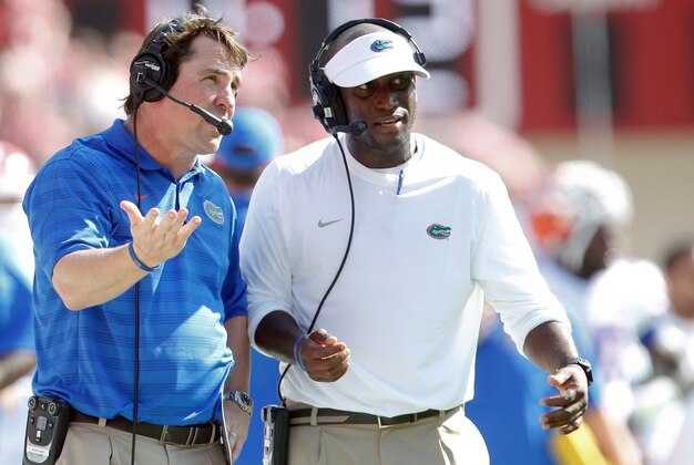 Sep 20, 2014; Tuscaloosa, AL, USA; Florida Gators head coach Will Muschamp (left) and Travaris Robinson during the game against the Alabama Crimson Tide at Bryant-Denny Stadium. Mandatory Credit: Marvin Gentry-USA TODAY Sports