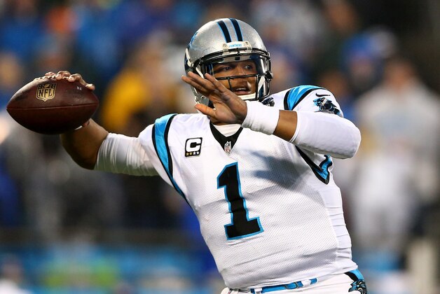 CHARLOTTE, NC - JANUARY 03:  Cam Newton #1 of the Carolina Panthers attempts a pass during their NFC Wild Card Playoff game against the Arizona Cardinals at Bank of America Stadium on January 3, 2015 in Charlotte, North Carolina.  (Photo by Streeter Lecka/Getty Images)