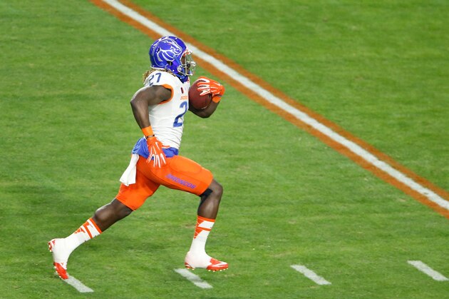 GLENDALE, AZ - DECEMBER 31:  Running back Jay Ajayi #27 of the Boise State Broncos rushes the football en route to scoring a 56 yard touchdown against the Arizona Wildcats during the frist quarter of the Vizio Fiesta Bowl at University of Phoenix Stadium on December 31, 2014 in Glendale, Arizona.  (Photo by Christian Petersen/Getty Images)