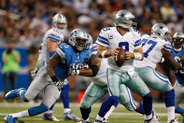 DETROIT, MI - OCTOBER 27: Tony Romo #9 of the Dallas Cowboys looks to get off a pass while feeling the pressure from the Detroit Lions at Ford Field on October 27, 2013 in Detroit, Michigan. (Photo by Gregory Shamus/Getty Images)