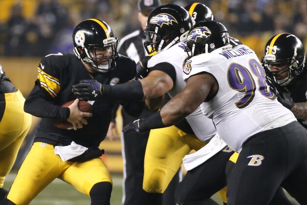 Pittsburgh Steelers quarterback Ben Roethlisberger (7) is sacked by Baltimore Ravens defensive end Haloti Ngata (92) in the first quarter an NFL wildcard playoff football game against the Baltimore Ravens, Saturday, Jan. 3, 2015, in Pittsburgh. (AP Photo/Gene J. Puskar)