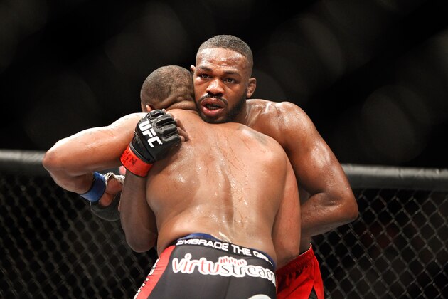 LAS VEGAS, NV - JANUARY 03:  Light heavyweight champion Jon Jones (R) grapples with Daniel Comier during the UFC 182 event at teh MGM Grand Garden Arena on January 3, 2015 in Las Vegas, Nevada. Jones retained his title by unanimous decision.  (Photo by Steve Marcus/Getty Images)