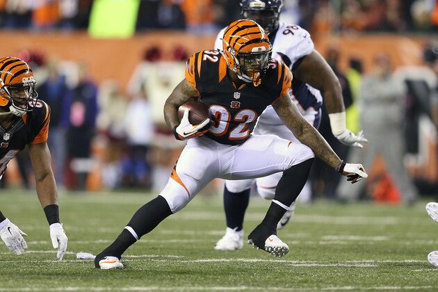 CINCINNATI, OH - DECEMBER 22:  Jeremy Hill #32 of the Cincinnati Bengals carries the ball during the second quarter of the game against the Denver Broncos at Paul Brown Stadium on December 22, 2014 in Cincinnati, Ohio. (Photo by Andy Lyons/Getty Images)