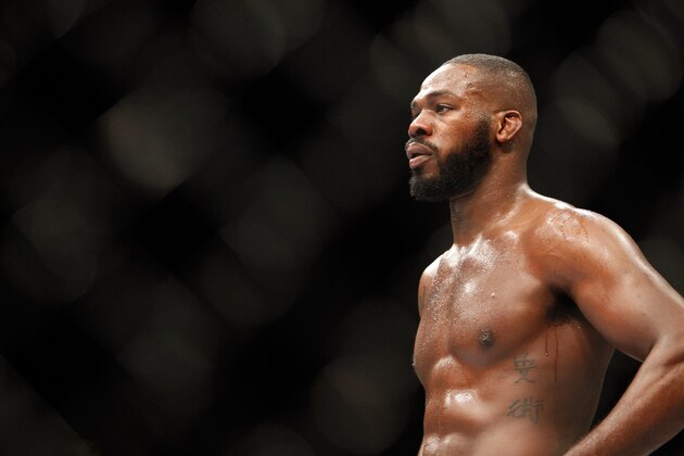 LAS VEGAS, NV - JANUARY 03:  Light heavyweight champion Jon Jones waits in a time-out as he defends his title against Daniel Cormier during the UFC 182 event  at the MGM Grand Garden Arena on January 3, 2015 in Las Vegas, Nevada. Jones retained his title by unanimous decision. (Photo by Steve Marcus/Getty Images)