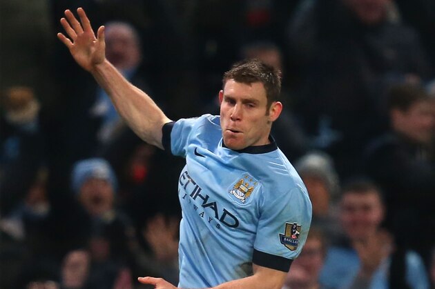 MANCHESTER, ENGLAND - JANUARY 04:  James Milner of Manchester City celebrates after scoring his team's second goal to take a 2-1 lead during the FA Cup Third Round match between  Manchester City and Sheffield Wednesday at Etihad Stadium on January 4, 2015 in Manchester, England.  (Photo by Jan Kruger/Getty Images)