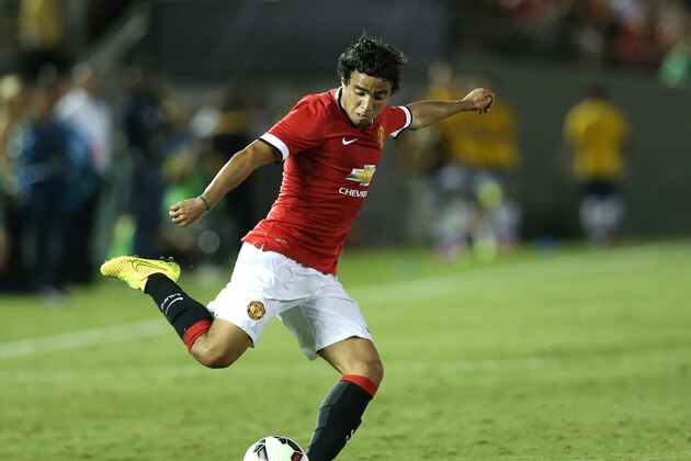 PASADENA, CA - JULY 23:  Rafael #2 of Manchester United centers the ball against the Los Angeles Galaxy at the Rose Bowl on July 23, 2014 in Pasadena, California. Manchester United won 7-0.  (Photo by Stephen Dunn/Getty Images)