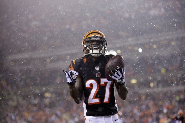 Cincinnati Bengals cornerback Dre Kirkpatrick celebrates after interception Denver Broncos quarterback Peyton Manning during the second half of an NFL football game Monday, Dec. 22, 2014, in Cincinnati. The Bengals won 37-28. (AP Photo/AJ Mast)