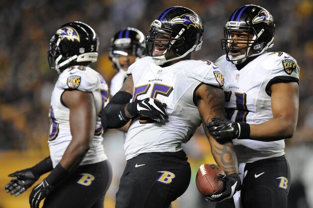 Baltimore Ravens outside linebacker Terrell Suggs (55) celebrates after intercepting a pass by Pittsburgh Steelers quarterback Ben Roethlisberger (7) in the fourth quarter of an NFL wildcard playoff football game, Saturday, Jan. 3, 2015, in Pittsburgh. (AP Photo/Don Wright)
