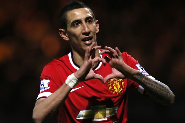 Manchester United’s Angel Di Maria celebrates after scoring his sides second goal of the game during their English FA Cup third round soccer match between Yeovil Town and Manchester United at Huish Park stadium in Yeovil, England, Sunday, Jan.  4, 2015 . (AP Photo/Alastair Grant)