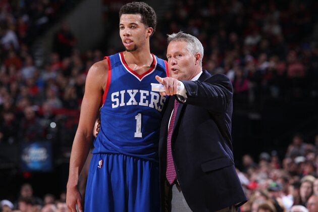 PORTLAND, OR - DECEMBER 26:  Michael Carter-Williams #1 and Brett Brown of the Philadelphia 76ers talk during the game against the Portland Trail Blazers on December 26, 2014 at the Moda Center Arena in Portland, Oregon. NOTE TO USER: User expressly acknowledges and agrees that, by downloading and or using this photograph, user is consenting to the terms and conditions of the Getty Images License Agreement. Mandatory Copyright Notice: Copyright 2014 NBAE (Photo by Sam Forencich/NBAE via Getty Images)