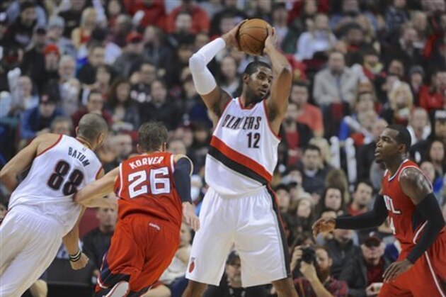 Atlanta Hawks' Paul Millsap, right, defends Portland Trail Blazers' LaMarcus Aldridge (12) during the second half of an NBA basketball game in Portland, Ore., Saturday, Jan. 3, 2015. The Hawks beat the Trail Blazers 115-107. (AP Photo/Greg Wahl-Stephens) Atlanta Hawks' Paul Millsap, right, defends Portland Trail Blazers' LaMarcus Aldridge (12) during the second half of an NBA basketball game in Portland, Ore., Saturday, Jan. 3, 2015. The Hawks beat the Trail Blazers 115-107. (AP Photo/Greg Wahl-Stephens)