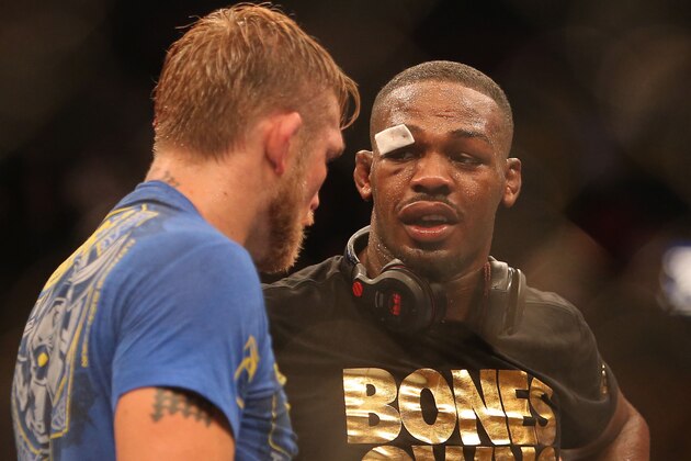 Sep 21, 2013; Toronto, Ontario, CAN; Jon Jones talks to Alexander Gustafsson (left) after their Light Heavyweight Championship bout while wearing the championship belt at UFC 165 at the Air Canada Centre. Mandatory Credit: Tom Szczerbowski-USA TODAY Sports