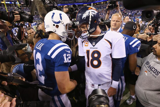 INDIANAPOLIS, IN - OCTOBER 20:  Andrew Luck #12 of the Indianapolis Colts and Peyton Manning #18 of the Denver Broncos meet after the game at Lucas Oil Stadium on October 20, 2013 in Indianapolis, Indiana. The Colts won 39-33. (Photo by Andy Lyons/Getty Images)