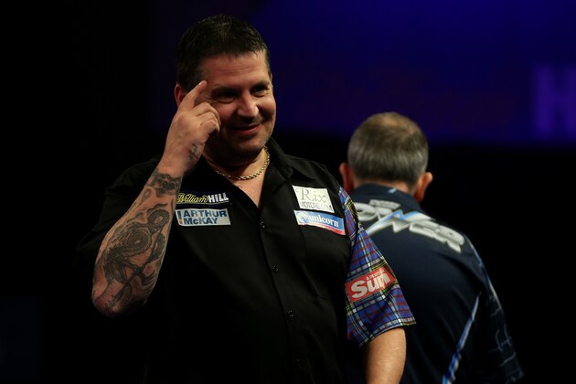 LONDON, ENGLAND - JANUARY 04:  Gary Anderson of Scotland gestures during the final of the 2015 William Hill PDC World Darts Championships at Alexandra Palace on January 4, 2015 in London, England.  (Photo by Ben Hoskins/Getty Images)